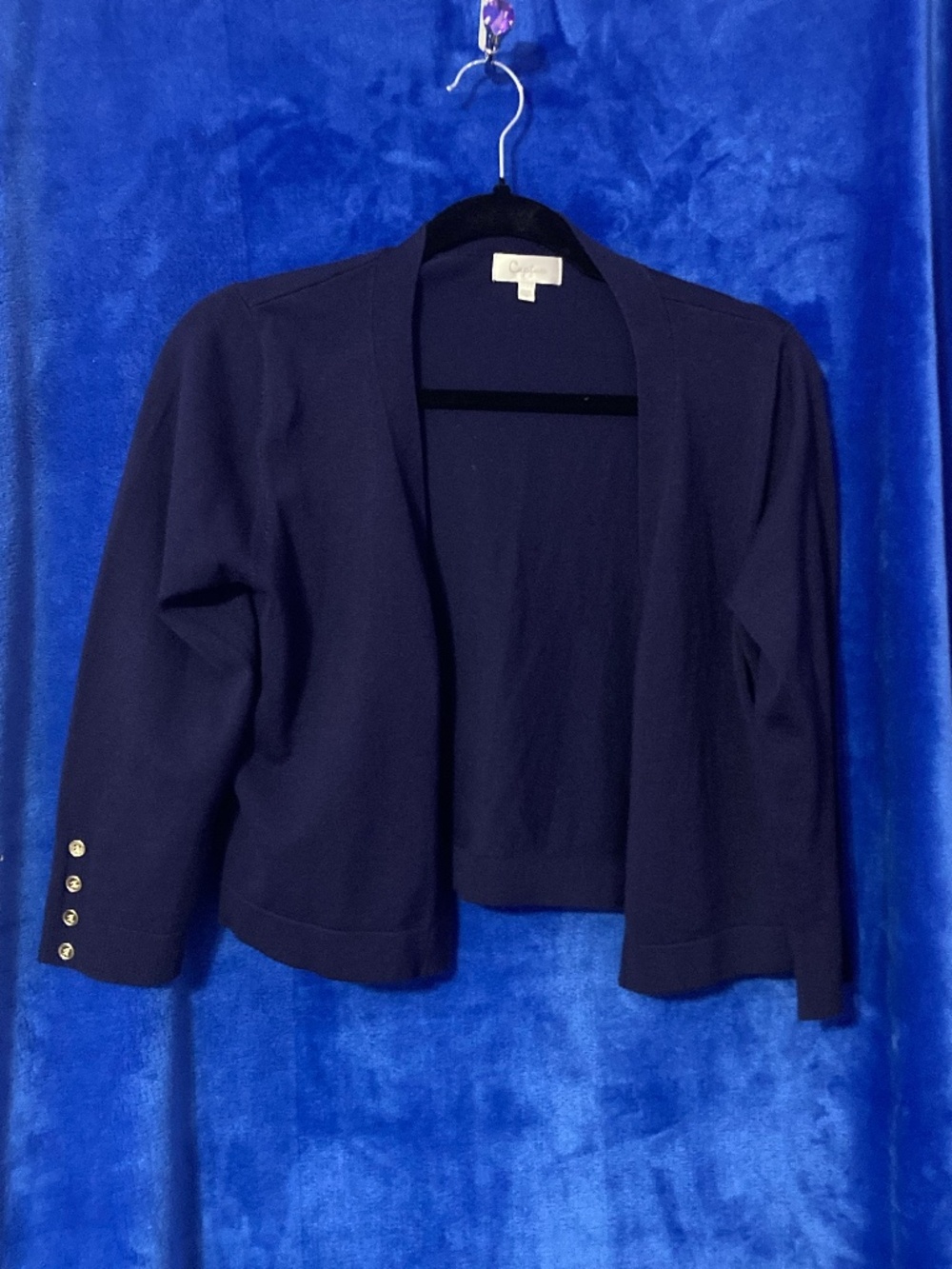 Navy blue cardigan with gold button detailing